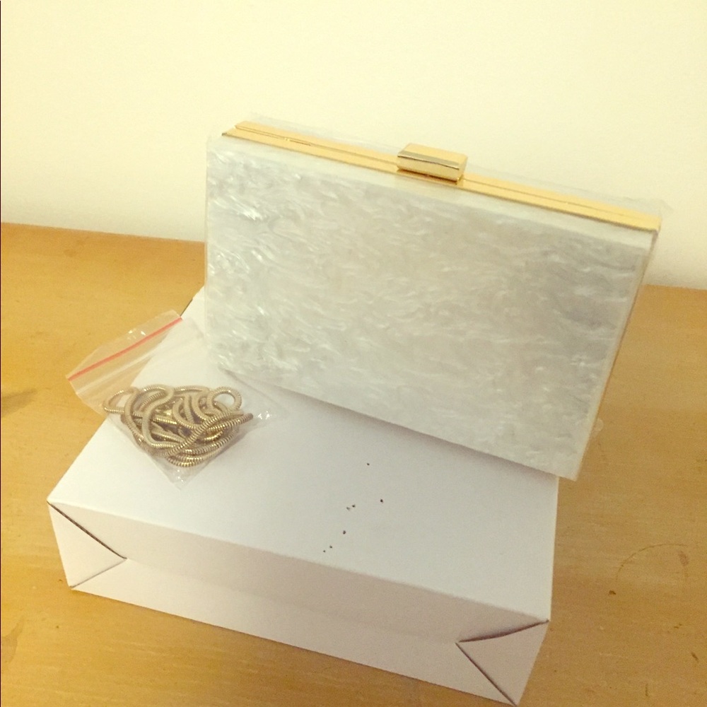 New, never used Rachel Zoe clutch!